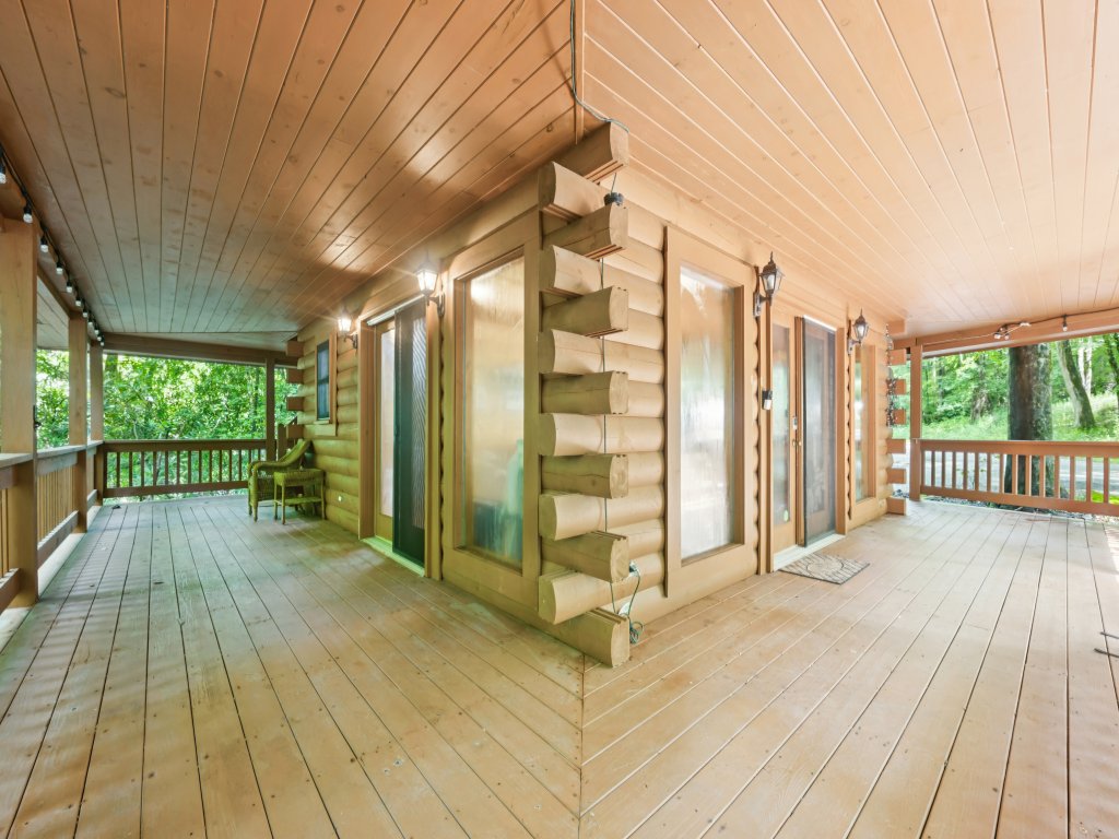 Cozy Creekside Cabin with Wraparound Porch Vacation Rental in North Carolina - RedAwning
