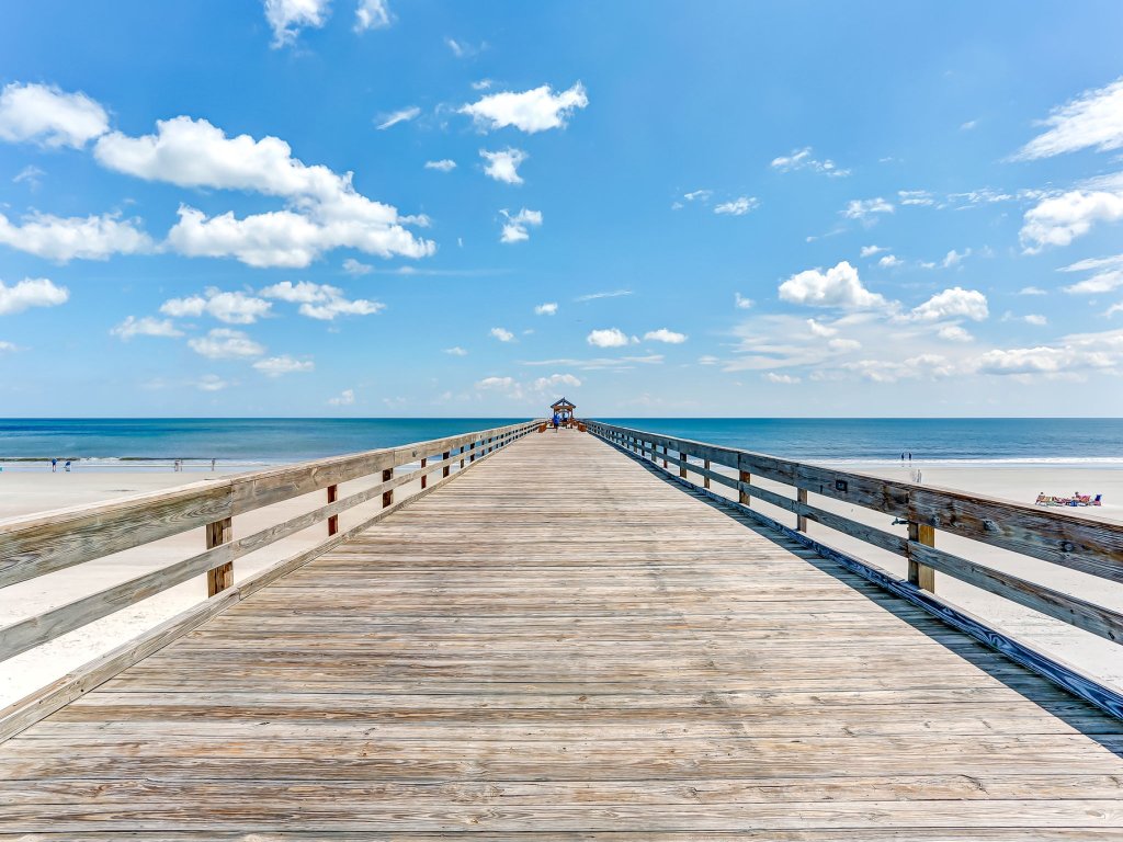 Beachfront Family Condo w/ Pool, Fishing, and Pier Access | Amelia by the Sea Vacation Rental in Florida - RedAwning