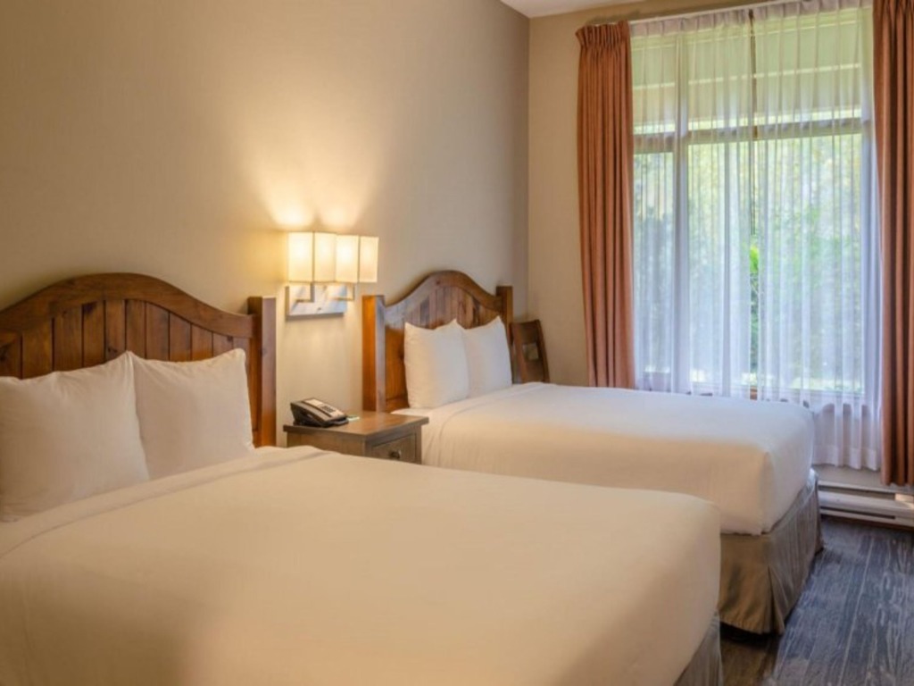 Cahilty Hotel and Suites Hotel Room, 2 Queen Sleeps 4 #435 Vacation Rental - RedAwning
