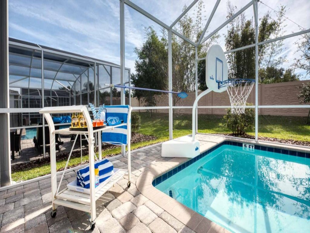 Spacious 5 Bed Pool Home with Game Room Vacation Rental in Davenport - RedAwning