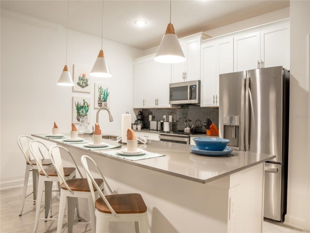 Stunning 4 Bed Townhome  Pool & WaterPark Vacation Rental in Davenport - RedAwning