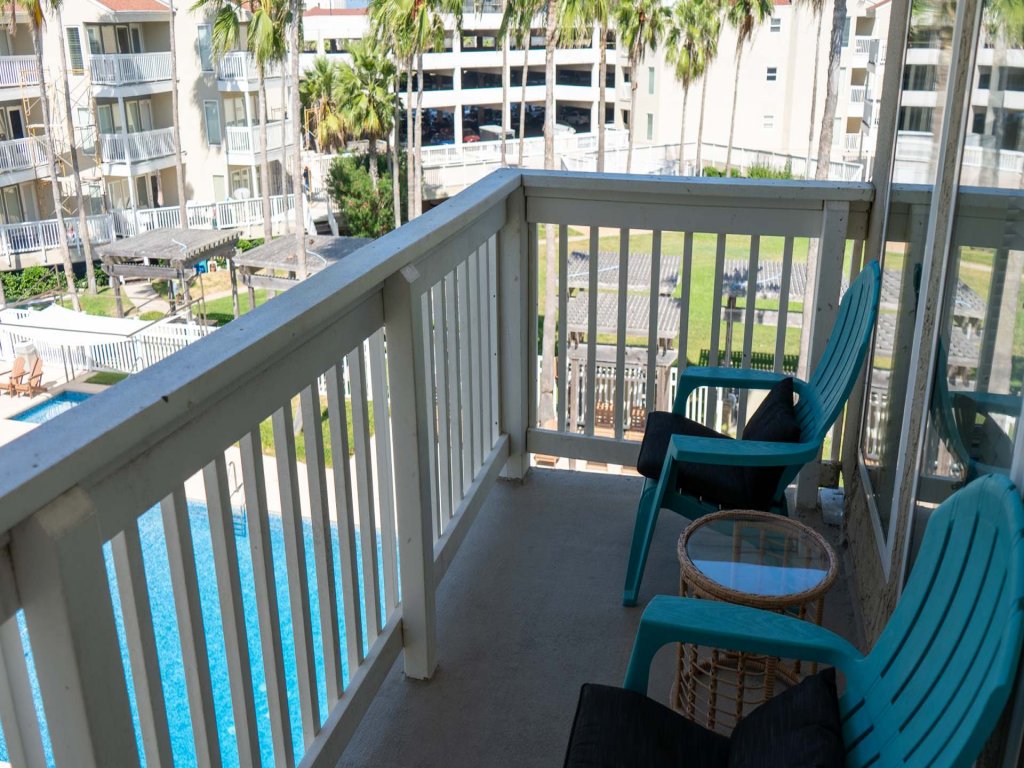Fresh & Bright 1BR Condo - Pool View & Steps to Beach Vacation Rental in South Padre Island - RedAwning