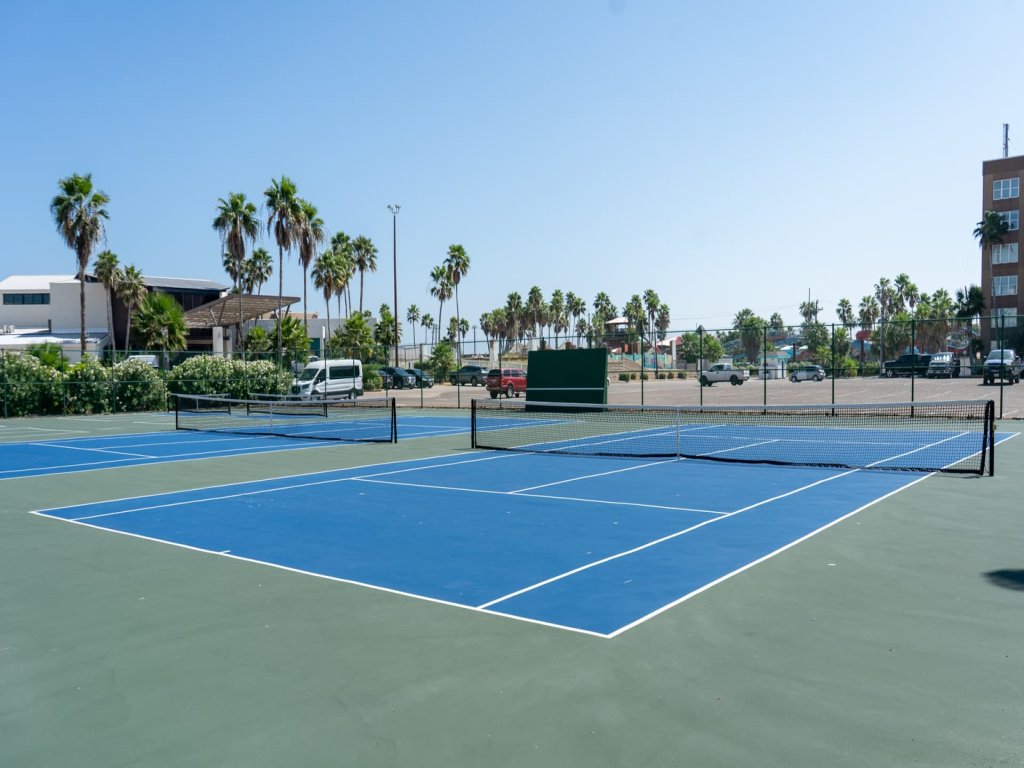 Fresh & Bright 1BR Condo - Pool View & Steps to Beach Vacation Rental in South Padre Island - RedAwning
