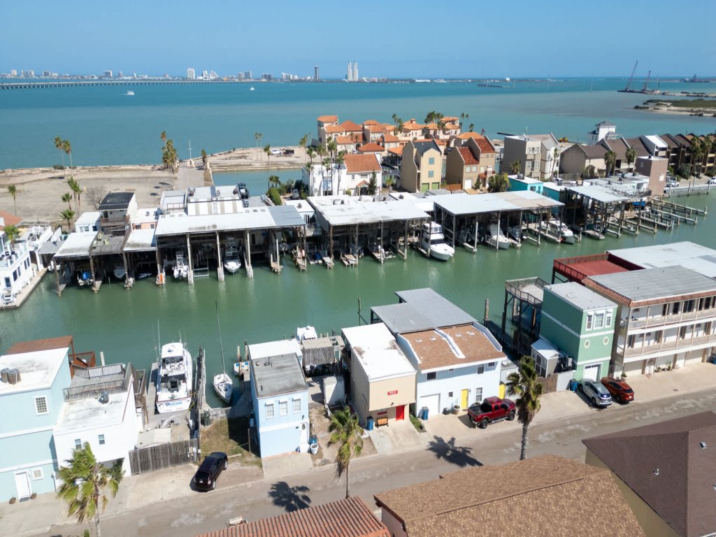 Channelfront - Dock - Fishing - BBQ - Deck Vacation Rental in Port Isabel - RedAwning