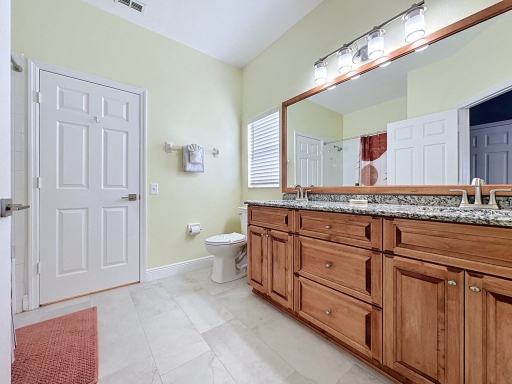 Whispering Palms - Luxury 4-Bedroom Pool Home Near Vacation Rental in Kissimmee - RedAwning