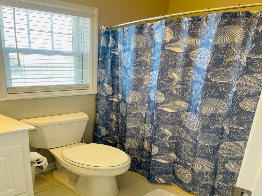 FINS to the Left / 1295 Ocean Blvd West Vacation Rental in Holden Beach - RedAwning