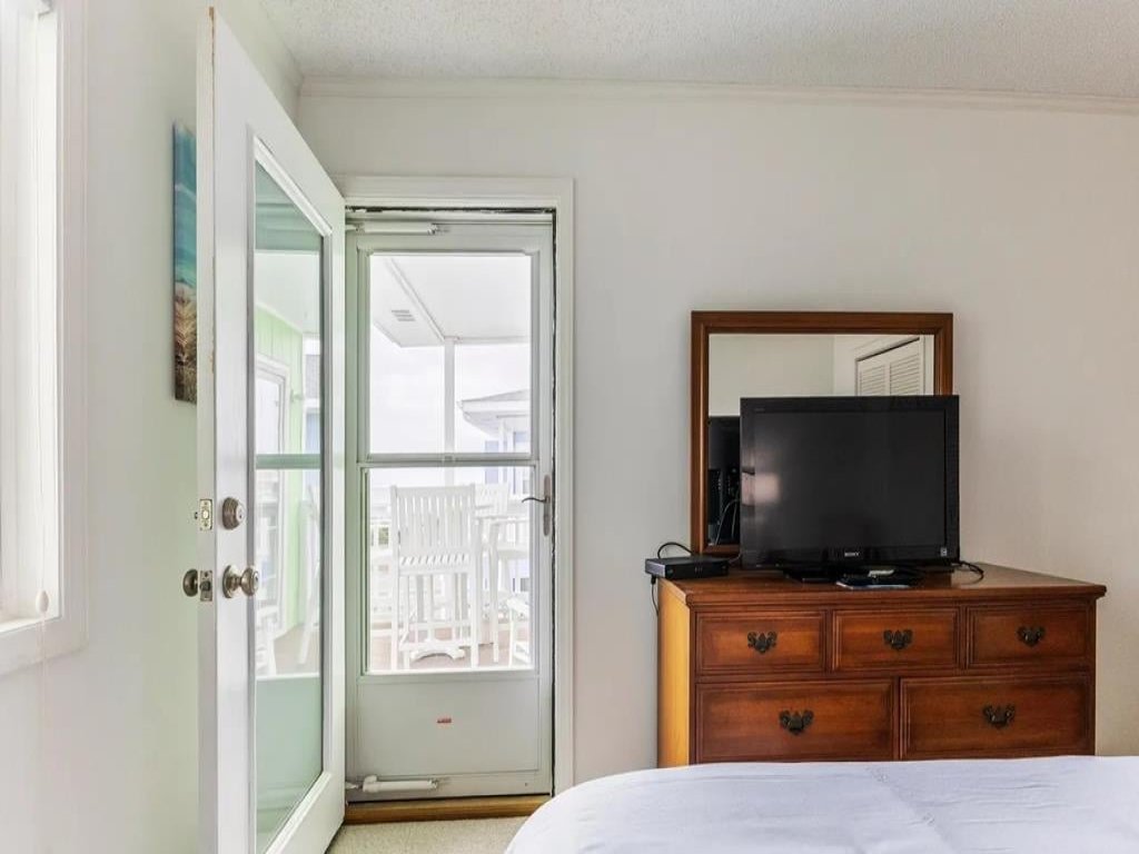 Beauty & The Beach - 8B / 1068 Ocean Blvd West Vacation Rental in Holden Beach - RedAwning