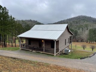 Peaceful family cabin near fishing with over 100 acres of mountain and field trails to explore!