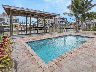 218 Oasis: Heated Pool Home w/ Dock Access + Walk to Beach!